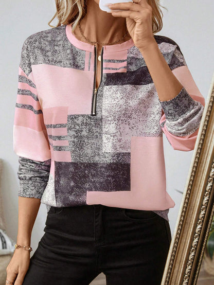 SANDRA – BLUSA ZIP-UP MODERNA