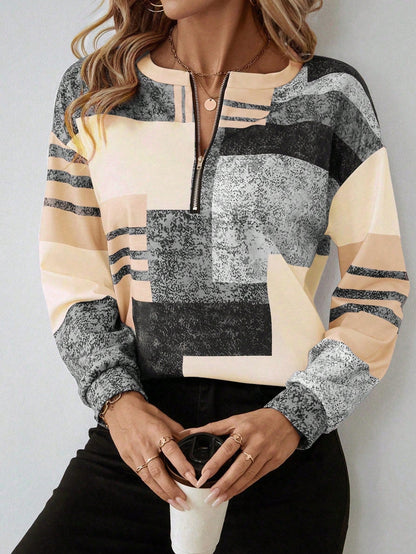 SANDRA – BLUSA ZIP-UP MODERNA