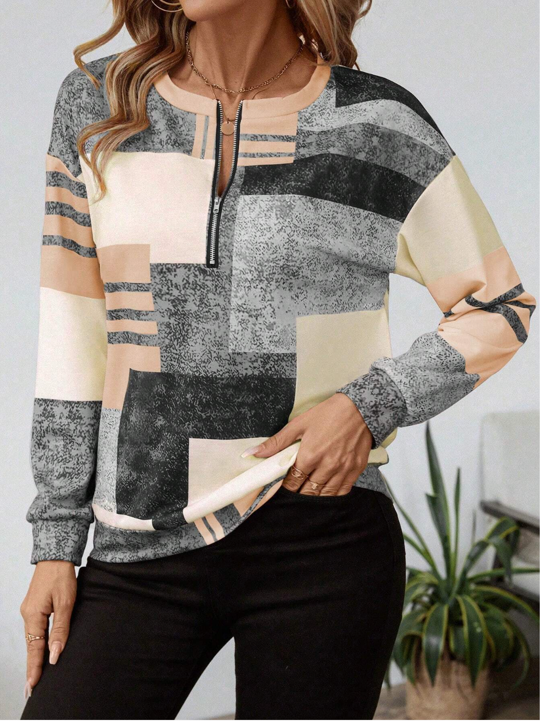 SANDRA – BLUSA ZIP-UP MODERNA