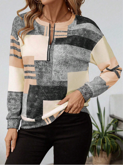 SANDRA – BLUSA ZIP-UP MODERNA